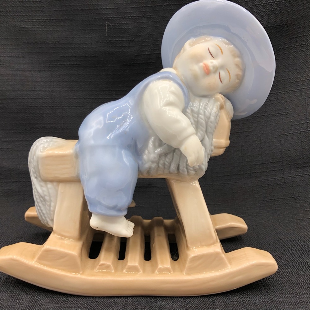 Kalique Fine Porcelain figure of Boy on Rocking Ho